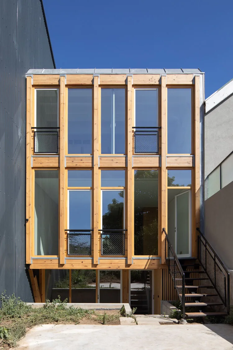 Reabilitação estrutura de madeira betão edificio residencial timber concret composite single family building 05